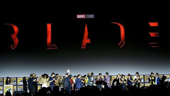 A crowd onstage below a Blade graphic after the film was announced at Comic-Con 2019.