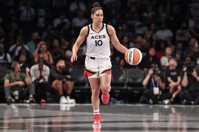 Aug 6, 2023; Brooklyn, New York, USA; Las Vegas Aces guard Kelsey Plum (10) brings the ball up court in the third quarter against the New York Liberty at Barclays Center.