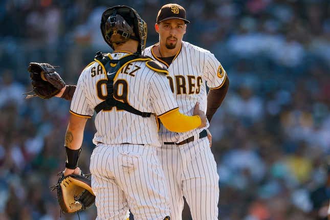 Jun 17, 2023; San Diego, California, USA; San Diego Padres starting pitcher Blake Snell (4) talks with San Diego Padres catcher Gary S nchez (99) on the mound in fourth inning against the Tampa Bay Rays at Petco Park.