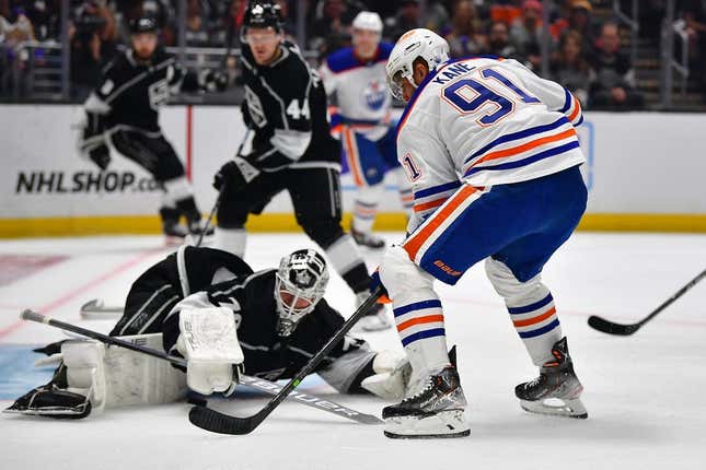 Apr 23, 2023; Los Angeles, California, USA; Edmonton Oilers left wing Evander Kane (91) moves in for a shot against Los Angeles Kings goaltender Joonas Korpisalo (70) during the first period in game four of the first round of the 2023 Stanley Cup Playoffs at Crypto.com Arena.