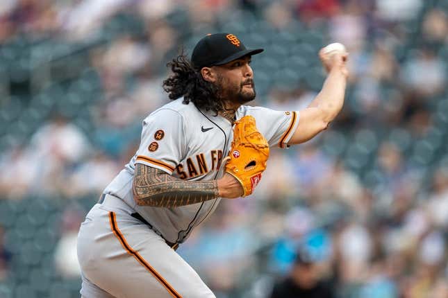 May 22, 2023; Minneapolis, Minnesota, USA; San Francisco Giants relief pitcher Sean Manaea (52) delivers a pitch in the third inning against the Minnesota Twins at Target Field.