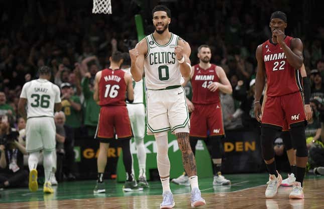 May 17, 2023; Boston, Massachusetts, USA; Boston Celtics forward Jayson Tatum (0) reacts after a play during the first half against the Miami Heat in game one of the Eastern Conference Finals for the 2023 NBA playoffs at TD Garden.