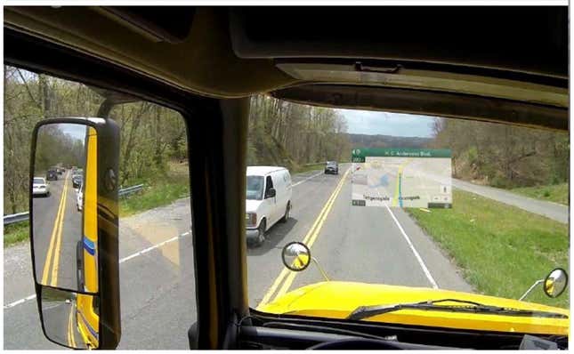 The driver of this car may know exactly where he’s going but he probably can’t see the nearby car hidden behind the map.