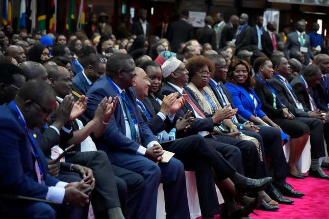 Delegates are seated during the official opening of the Africa Climate Summit at the Kenyatta International Convention Centre in Nairobi, Kenya, Monday, Sept. 4, 2023. The first African Climate Summit opened with heads of state and others asserting a stronger voice on a global issue that affects the continent of 1.3 billion people the most, even though they contribute to it the least. (AP Photo/Khalil Senosi)