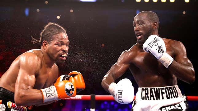 WBO champion Terence Crawford punches Shawn Porter during their welterweight title fight  in Las Vegas, Nevada. 
