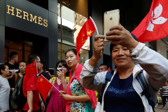 Visitors celebrate China’s National Day in Hong Kong on Oct. 1, 2016.