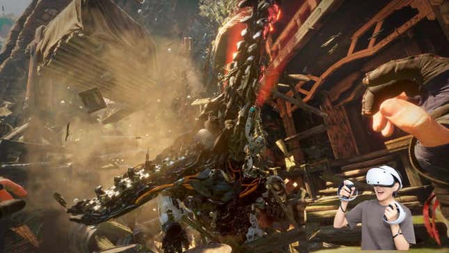 A person with the PSVR2 headset and controllers is in the bottom right corner of the screen while the main image is of a giant robot dinosaur charging at the screen.