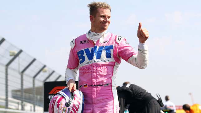 Nico Hulkenberg in pink Racing Point overalls.