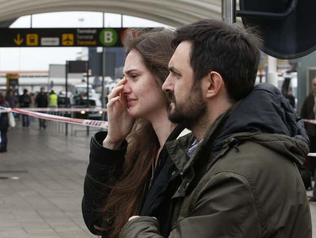 Family members of passengers killed in Germanwings plane crash arrive at Barcelona’s El Prat Airport.