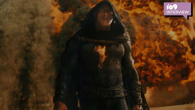 Black Adam in a hood with fire around him