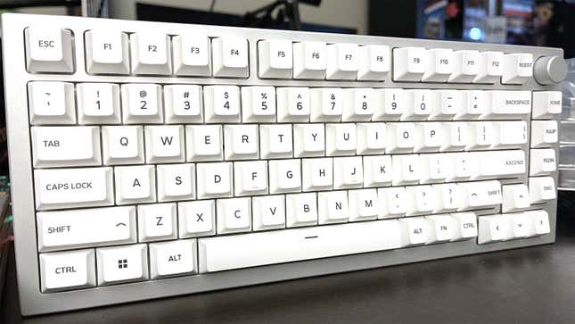 A completed GMMK Pro keyboard, silver, with frosty white keycaps. 