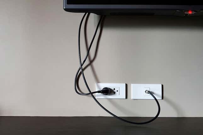 Image for article titled How to Safely Run Electrical Cords in Your Home (and What You Should Never Do)