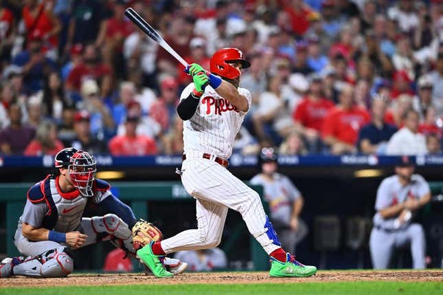 Aug 25, 2023; Philadelphia, Pennsylvania, USA; Philadelphia Phillies first baseman Bryce Harper (3) hits a triple against the St. Louis Cardinals in the seventh inning at Citizens Bank Park.