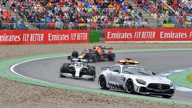A Mercedes-Benz AMG GT F1 safety car leads a Mercedes racer on track. 