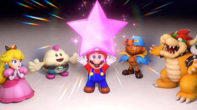 Mario holds up a pink star in front of his friends. 