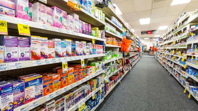 aisle of medications in a pharmacy