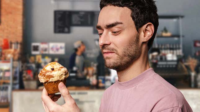 Image for article titled Man Reflecting On Where He Went Wrong In Life To Deserve Worst-Looking Chocolate Chip Muffin At Coffee Shop