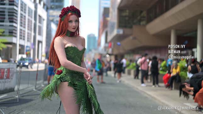 A cosplayer dressed as Poison Ivy smirks. 