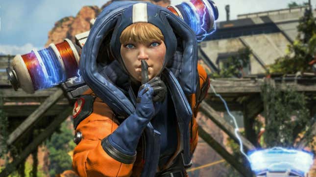 Natalie "Wattson" Paquette is holding a finger up to her closed mouth, telling everyone to shut up and play the game.