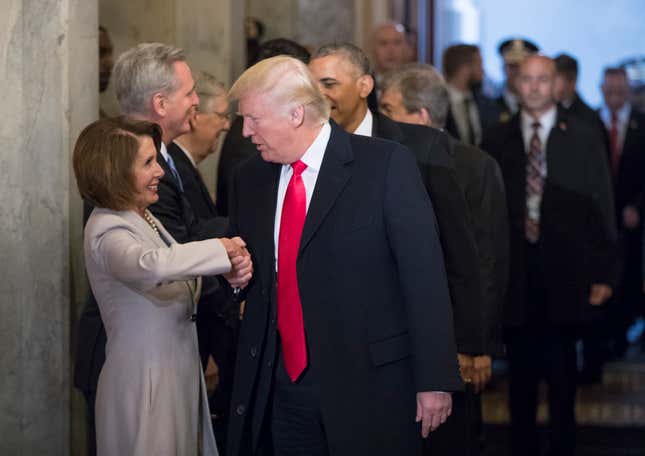 With Nancy Polosi. (AP Photo/Pool/J. Scott Applewhite)