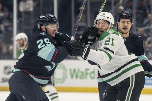 May 7, 2023; Seattle, Washington, USA; Seattle Kraken defenseman Vince Dunn (29) and Dallas Stars forward Jason Robertson (21) shove one another during the first period in game three of the second round of the 2023 Stanley Cup Playoffs at Climate Pledge Arena.