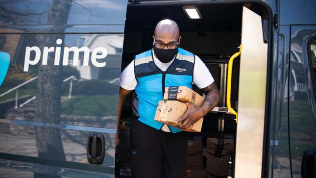 Photo of Amazon delivery driver carrying packages