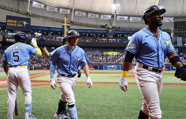 Apr 8, 2023; St. Petersburg, Florida, USA; Tampa Bay Rays second baseman Brandon Lowe (8) is congratulated after hitting a 3-run home run against the Oakland Athletics during the sixth inning at Tropicana Field.
