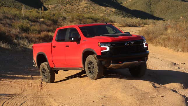 red 2023 chevy silverado zr2 parked on a berm in an off-road park