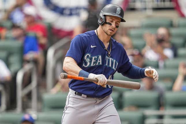 May 21, 2023; Cumberland, Georgia, USA; Seattle Mariners left fielder Jarred Kelenic (10) reacts after striking out against the Atlanta Braves during the ninth inning at Truist Park.