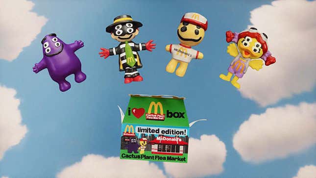 Promo art for McDonald's Adult Happy Meals, showing the toys and the box they come in.