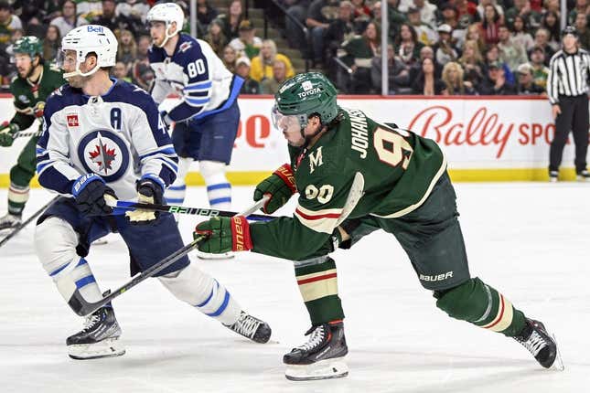 Apr 11, 2023; Saint Paul, Minnesota, USA;  Minnesota Wild forward Marcus Johansson (90) takes a shot on goal against the Winnipeg Jets during the second period at at Xcel Energy Center.