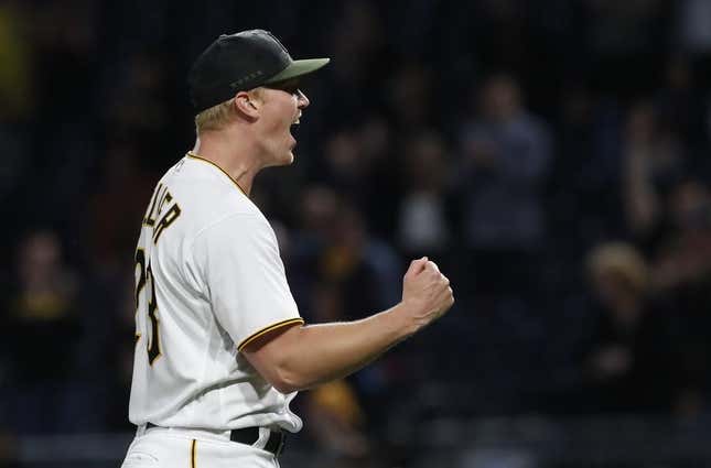 May 8, 2023; Pittsburgh, Pennsylvania, USA; Pittsburgh Pirates starting pitcher Mitch Keller (23) reacts after pitching a complete game four hit shutout against the Colorado Rockies at PNC Park. The Pirates shutout the Rockies 2-0.