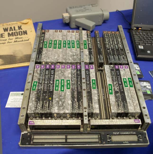Apollo Guidance Computer next to a laptop