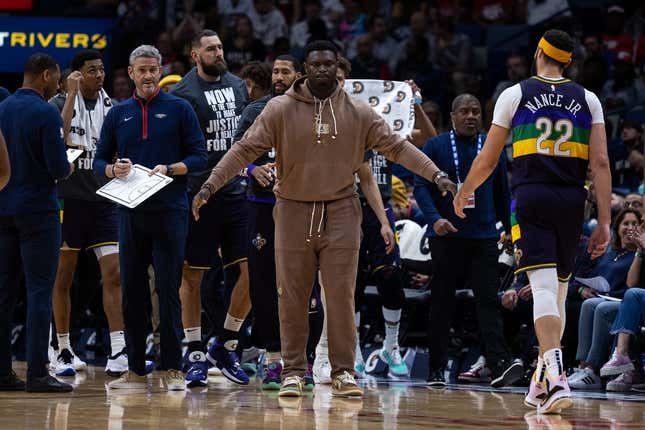 Jan 18, 2023; New Orleans, Louisiana, USA; New Orleans Pelicans forward Zion Williamson (1) meets his teammates during a time out against the Miami Heat during the first half at Smoothie King Center.