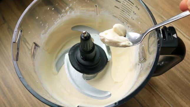 Whipped cream in a food processor. 