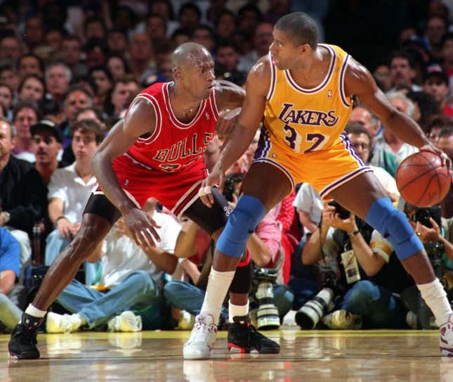  Lakers Earvin Johnson tries to move past Chicagos Bulls Michael Jordan during the NBA finals in 1991.