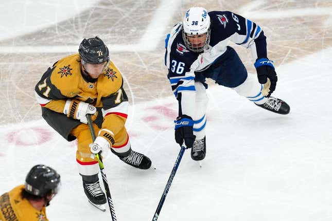 Apr 18, 2023; Las Vegas, Nevada, USA; Vegas Golden Knights center William Karlsson (71) skates against Winnipeg Jets center Morgan Barron (36) during the third period of game one of the first round of the 2023 Stanley Cup Playoffs at T-Mobile Arena.