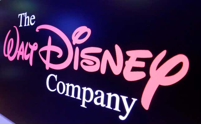 FILE - The Walt Disney Co. logo appears on a screen above the floor of the New York Stock Exchange, Aug. 7, 2017, in New York. The Walt Disney Co. is planning to invest approximately $60 billion into its theme parks and cruise lines over the next decade, as the company looks to continue growing one of its more successful business segments. The company said in a regulatory filing on Tuesday, Sept. 129, 2023, that the planned investment is nearly double what it spent in the prior 10-year period. (AP Photo/Richard Drew, File)