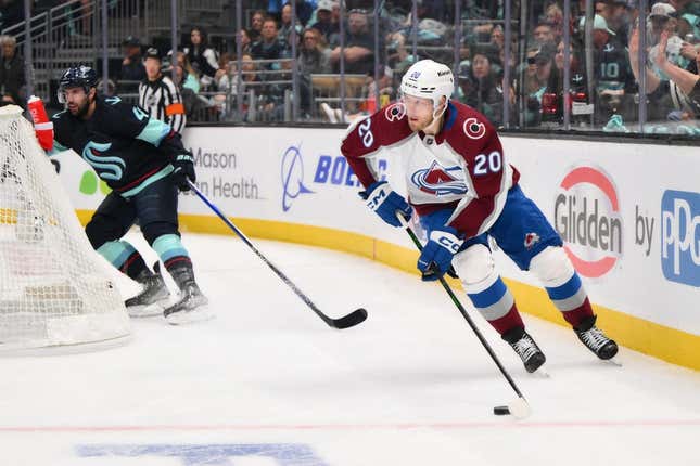 Apr 28, 2023; Seattle, Washington, USA; Colorado Avalanche center Lars Eller (20) plays the puck against the Seattle Kraken during the third period in game six of the first round of the 2023 Stanely Cup Playoffs at Climate Pledge Arena.