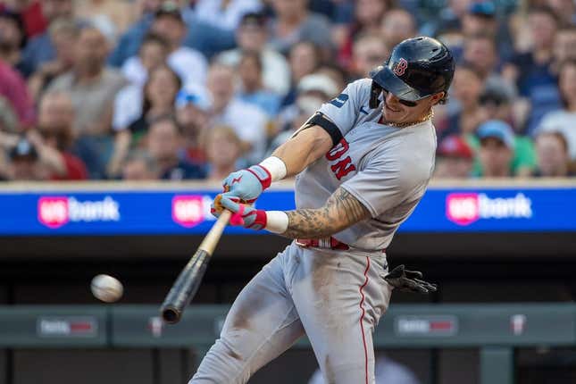 Jun 19, 2023; Minneapolis, Minnesota, USA; Boston Red Sox left fielder Jarren Duran (16) hits a two-RBI double against the Minnesota Twins in the fourth inning at Target Field.