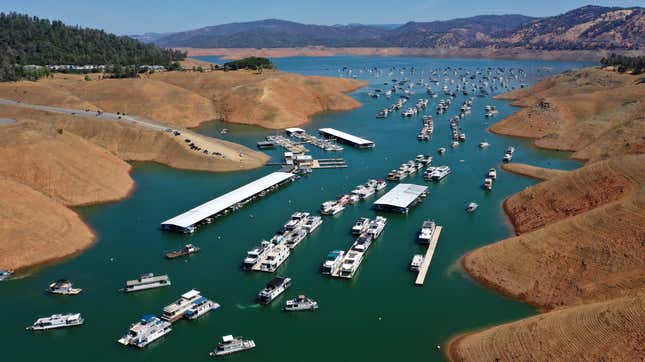 In an aerial view, houseboats sit anchored at the Bidwell Canyon Marina on Lake Oroville on Memorial Day.