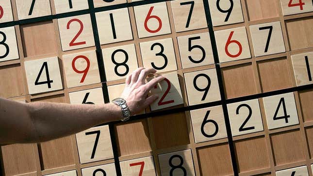 The images show a tourist completely a giant Sudoku. ChatGPT claimed it developed a new game similar to Sudoku.