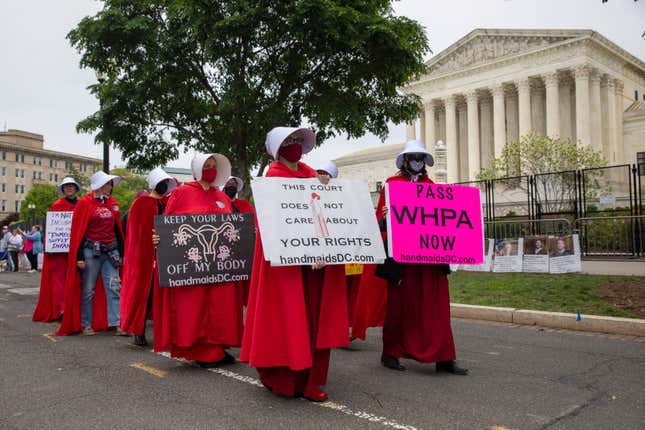 Abortion-rights protesters dressed in costumes from the "Handmaid's Tale," outside of the U.S. Supreme Court Sunday, May 8, 2022.