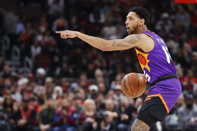 Mar 3, 2023; Chicago, Illinois, USA; Phoenix Suns guard Cameron Payne (15) brings the ball up court against the Chicago Bulls during the first half at United Center.