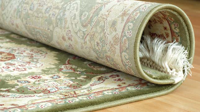 Image for article titled The Most Effective Ways to Flatten an Area Rug