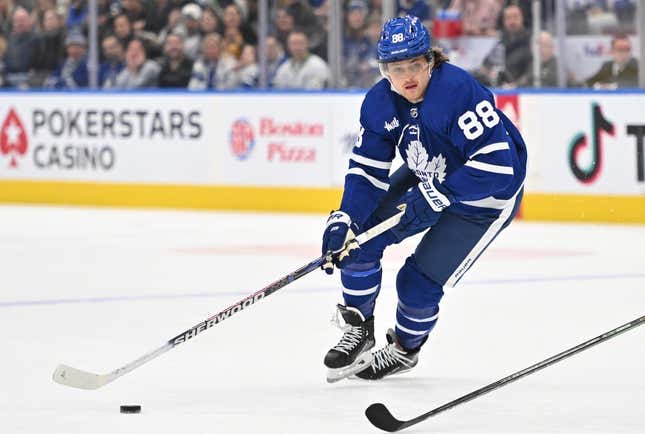 Feb 24, 2023; Toronto, Ontario, CAN;    Toronto Maple Leafs forward William Nylander (88) skates with the puck against the Minnesota Wild in the third period at Scotiabank Arena.