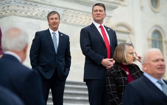 US Representative Ronny Jackson, Republican of Texas, stands alongside newly-sworn in first-term Republican members of Congress on the steps of the US Capitol in Washington, DC, January 4, 2021.
