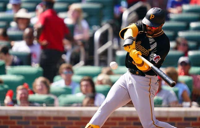 Sep 10, 2023; Cumberland, Georgia, USA; Pittsburgh Pirates right fielder Joshua Palacios (54) hits a triple against the Atlanta Braves during the seventh inning at Truist Park.