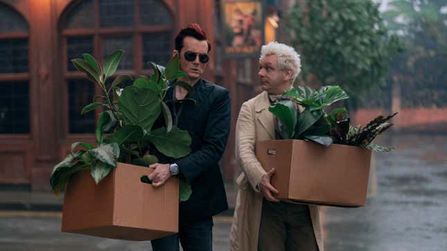 Crowley and Aziraphale holding boxes filled with plants on Good Omens