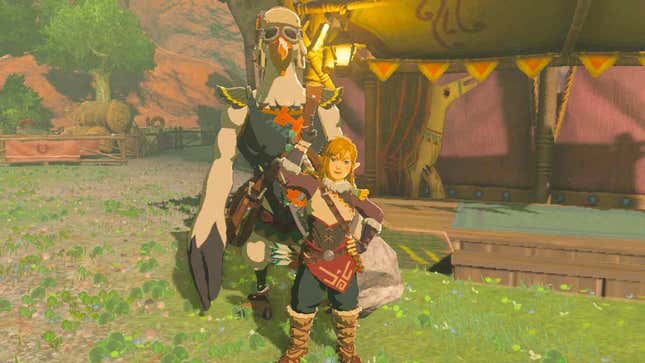 Link and Penn are seen posing for a photo in front of one of the stables.